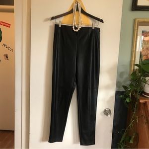 Ann Taylor black faux leather skinny pants with side zip. Never been worn.
